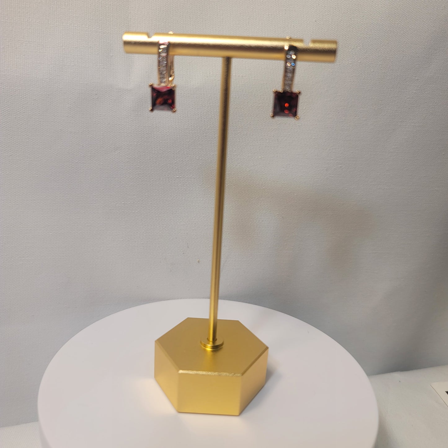 RED EMERALD SQUARE DROPS EARRINGS.