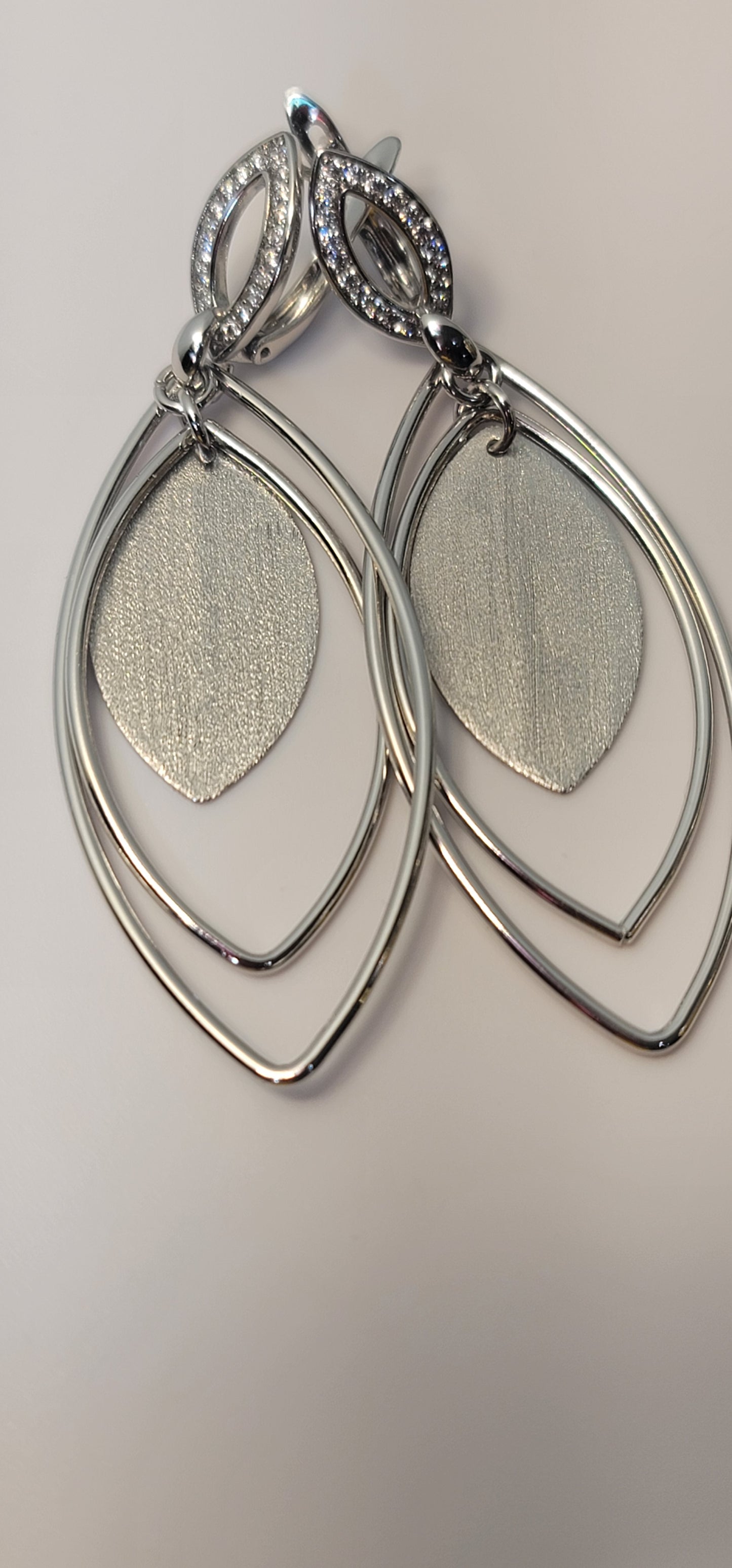 Elegant Silver Signature Earing Exclusive to Kathy's Fashion Jewelry.